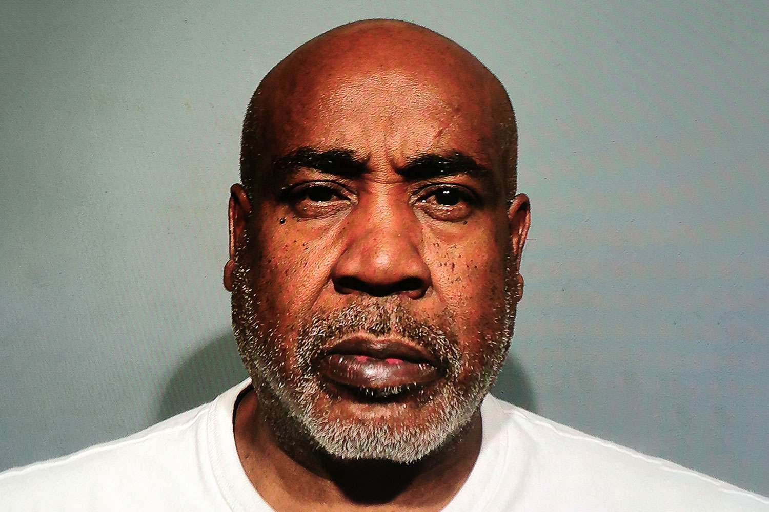Booking photo of Duane "Keffe D" Davis in a white T-shirt